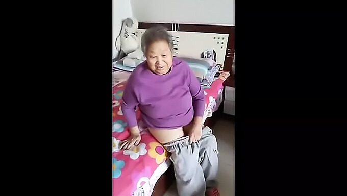 Asian granny shows off her homemade sex skills