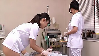 Japanese Healthcare Professionals Tend To Their Patients In A Medical Setting